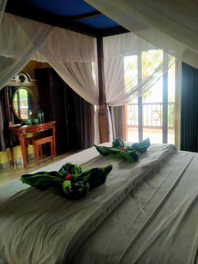 Coral Bay Bungalows Amed Exterior foto