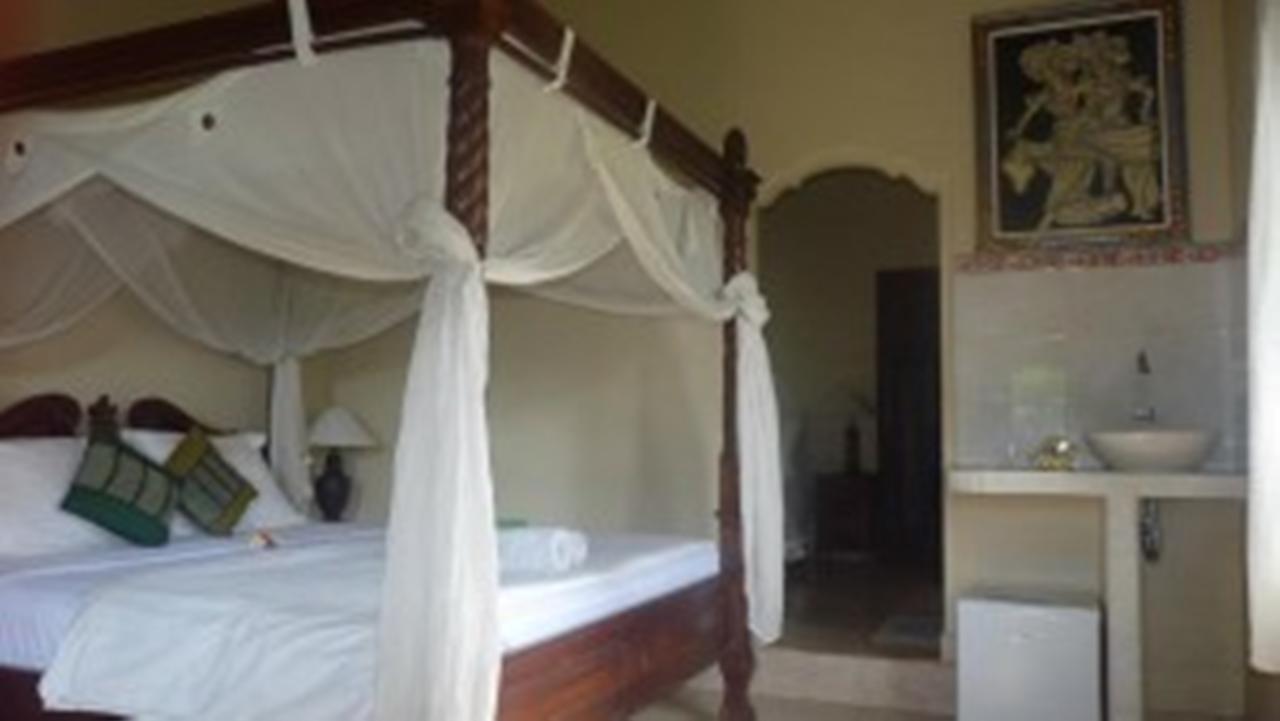 Coral Bay Bungalows Amed Exterior foto