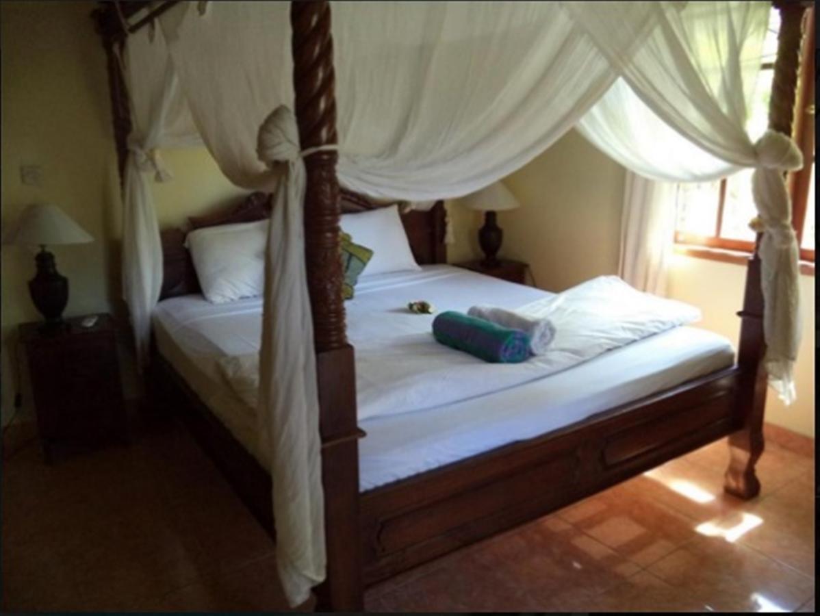 Coral Bay Bungalows Amed Exterior foto